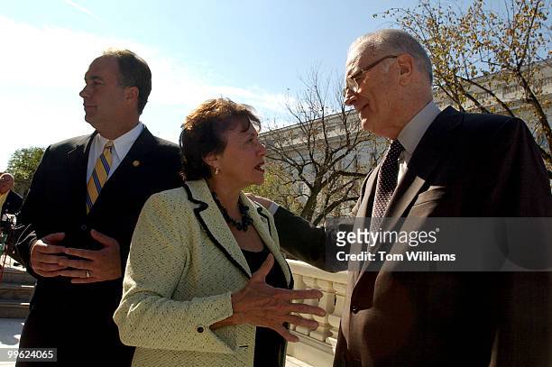 Rep. Nita Lowey, D-N.Y., talks with former Rep. Lee Hamilton, Vice Chair of the 9/11 Commission, as Rep. John Sweeney, R-N.Y., left, speaks to a...