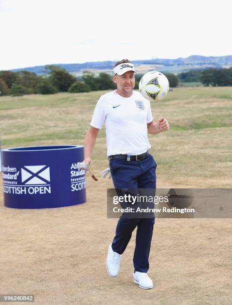 Ian Poulter of England is pictured wearing an England football shirt during the Pro Am event prior to the start of the Aberdeen Standard Investments...