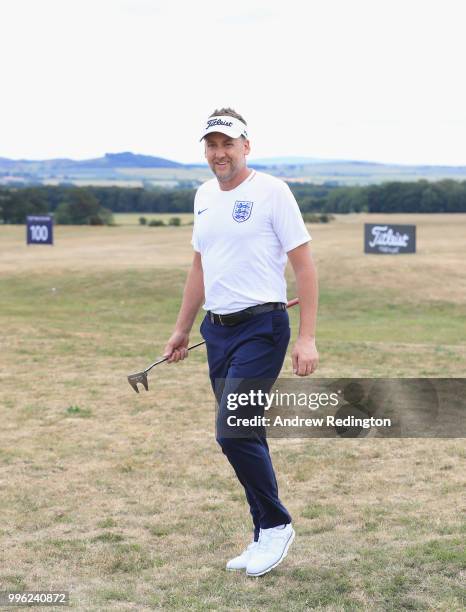 Ian Poulter of England is pictured wearing an England football shirt during the Pro Am event prior to the start of the Aberdeen Standard Investments...