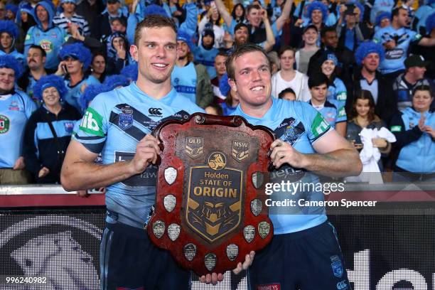 Tom Trbojevic of the Blues and Jake Trbojevic of the Blues pose with the trophy following game three of the State of Origin series between the...