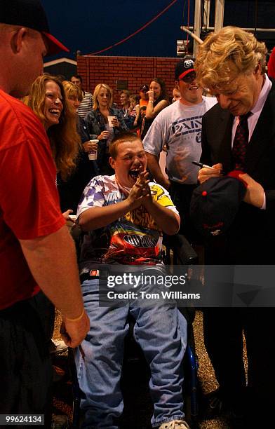 Joshua Zonne can harly contain himself when he sees potential Senate candidate Jerry Springer, D-Ohio, at a Chillicothe "Paints" minor league...