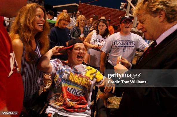 Joshua Zonne can harly contain himself when he sees potential Senate candidate Jerry Springer, D-Ohio, at a Chillicothe "Paints" minor league...