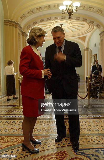 Sens. Kay Bailey Hutchison, R-Texas, and Jon Kyl, R-Ariz., talks in the Ohio Clock Corridor after Sen. Frist and numerous other Republicans, spoke to...