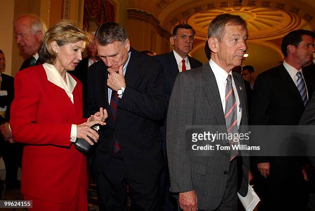 Sens. Kay Bailey Hutchison, R-Texas, and Jon Kyl, R-Ariz., talk in the Ohio Clock Corridor after Sen. Frist and numerous other Republicans, spoke to...