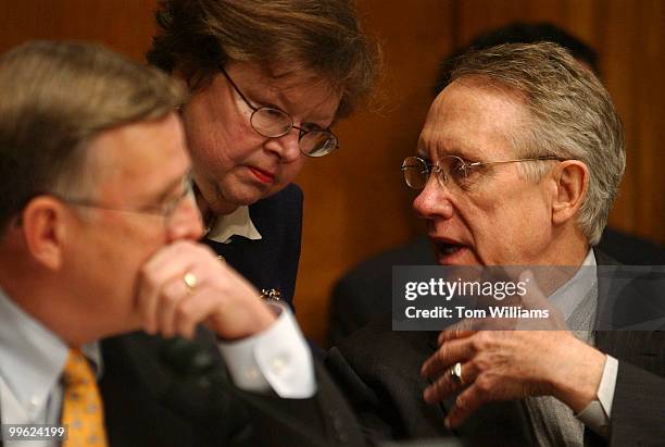 From left, Sens. Byron Dorgan, D-N.D., Barbara Mikulski, D-Md., and Harry Reid, D-Nev., have a discussion at a Democratic Policy Committee hearing on...