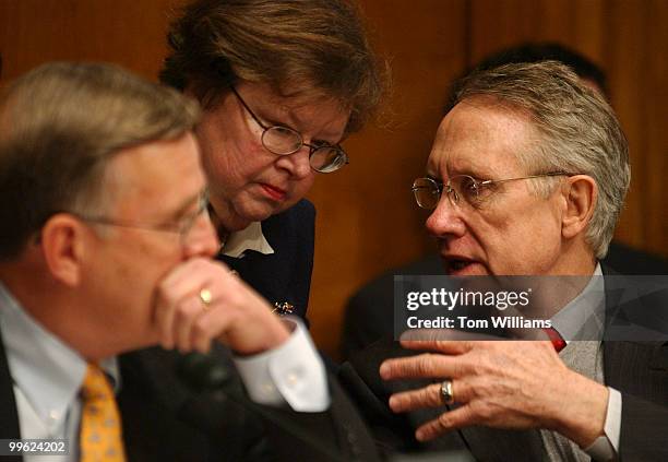 From left, Sens. Byron Dorgan, D-N.D., Barbara Mikulski, D-Md., and Harry Reid, D-Nev., have a discussion at a Democratic Policy Committee hearing on...