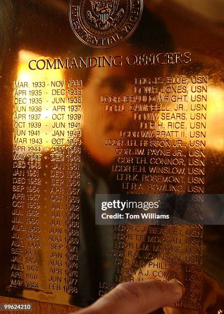 Gary Silversmith, owner of the U.S.S. Sequoia, points to a plaque with the names of all of her previous Capitains, while Presidential Yacht stays...