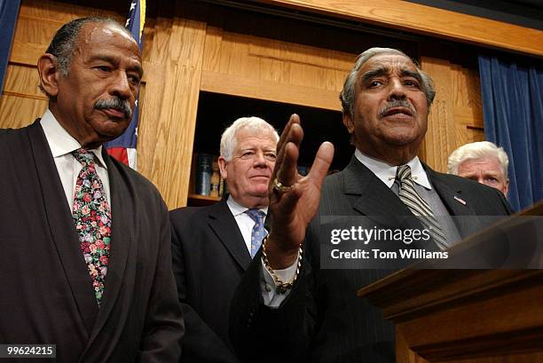 From left, Reps. John Conyers, Jim McDermott, D-Wash., Charlie Rangel, D-N.Y., and Jim Moran, D-Va., attend a news conference in which they railed...