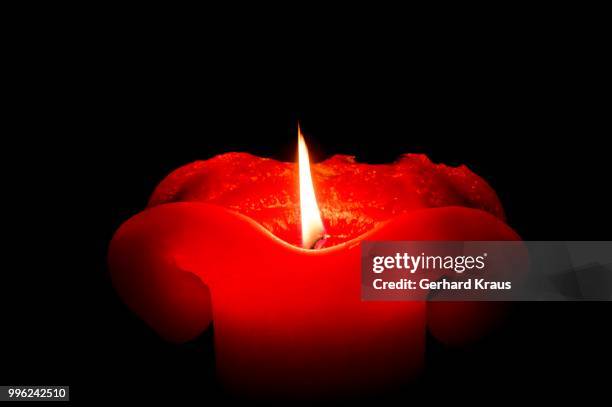 red candle - kraus stock pictures, royalty-free photos & images