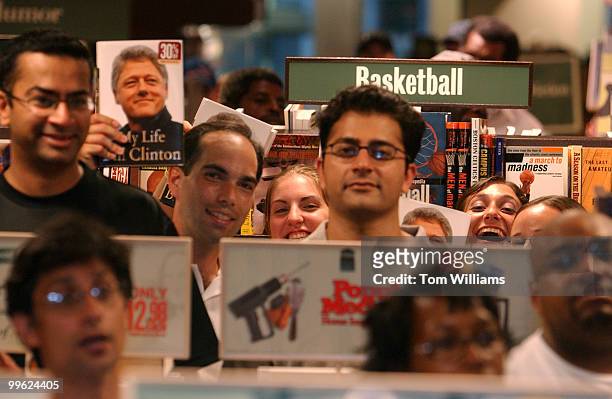 Fans of Bill Clinton, wait in line at the Barnes and Noble on 12th and E, NW, during a book signing by the former president.
