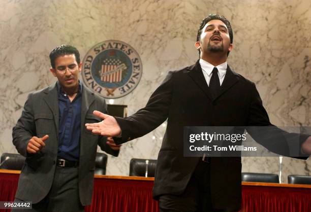 Panamanian brothers Alberto, left, and Ricardo Gaitanes, sing at a news conference in Hart Building, in support of the confirmation of Miguel Estrada...