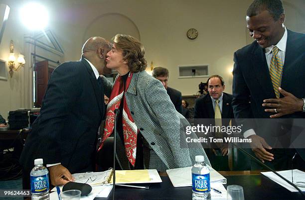 Sen. Blanche Lincoln, D-Ark., greets Rep. John Lewis, D-Ga., as former Congressman J.C. Watts looks on, before a Committee on House Administration...