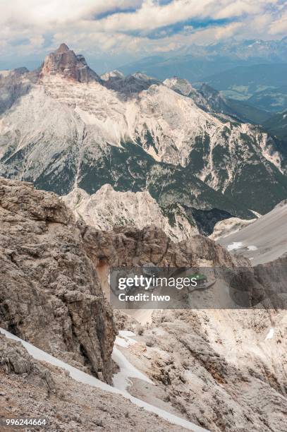 lorenzihuette refuge, 2932 m, mountain station of the cable car, at the back mt croda rossa, 3146 m, view from the marino bianchi via ferrata, cristallo group, ampezzo dolomites, cortina d'ampezzo, province of belluno, veneto, italy - marino stock pictures, royalty-free photos & images