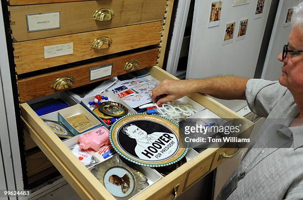 William Bird, curator, Smithsonian's National Museum of American History, goes through the museum's political memorabilia collection.