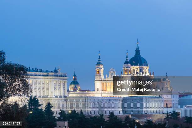 almudena cathedral and royal palace in madrid, spain. - almudena imagens e fotografias de stock