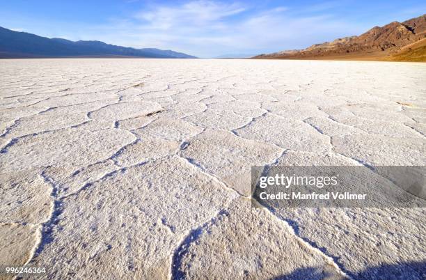 badwater basin, huge salt lake, the lowest point in north america, 86 m below sea level, death valley, nevada, united states - lowest point stock pictures, royalty-free photos & images