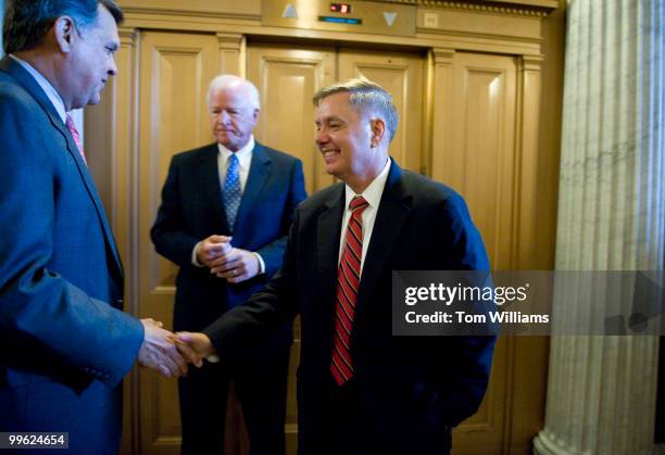 Sen. Mel Martinez, R-Fla., left, congratulates Sen. Lindsey Graham, R-S.C., on his "yes" vote on the nomination of Sonia Sotomayor to the Supreme...