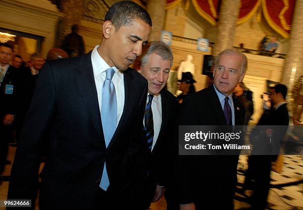 Sens. Barack Obama, D-Ill., Chuck Hagel, R-Neb., and Joe Biden, D-Del., make their way through Statuary Hall before President George W. Bush's State...