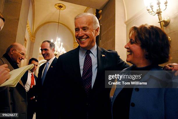 Sen. Joe Biden, D-Del., talks with Terese Casey, wife of Sen. Bob Casey, R-Pa., background, after President George W. Bush's State of the Union...
