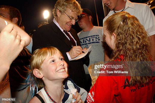 Potential Senate candidate Jerry Springer, D-Ohio, signs autographs at a Chillicothe "Paints" minor league baseball game after the Ross County...