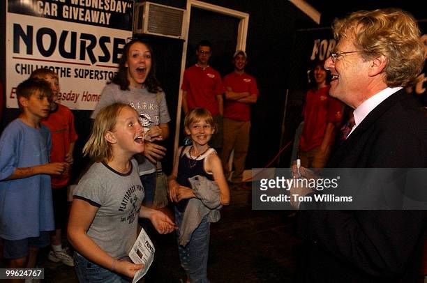 Youngsters are happy to see potential Senate candidate Jerry Springer, D-Ohio, at a Chillicothe "Paints" minor league baseball game after the Ross...