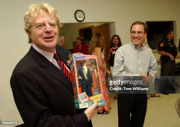 Potential Senate candidate Jerry Springer, D-Ohio, receives a doll of himself from Dustin Proehl at the Ross County Democratic Party Spring Dinner in...