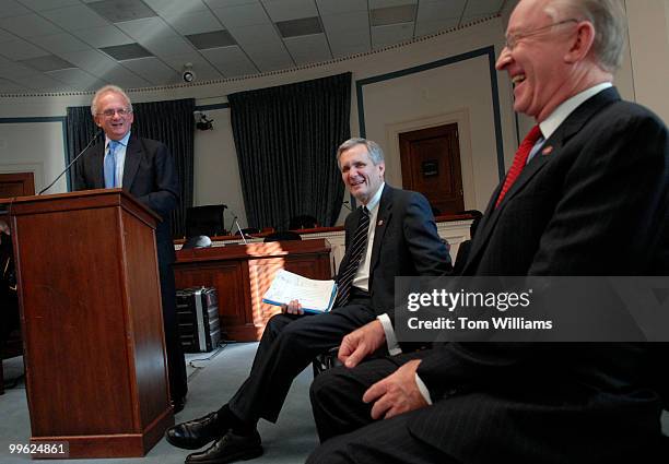 From left, Reps. Howard Berman, D-Calif., Lloyd Doggett, D-Texas, and Buck McKeon, R-Calif., speak at a news conference to urge Congress to act...