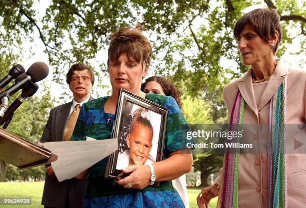 Lynn Starks of Oklahoma City whose 3 year old daughter was killed due to faulty children's bedding, finishes speaking at a press conference opposing...