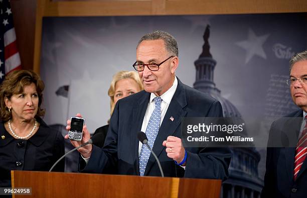 Sen. Charles Schumer, D-N.Y., speaks at a news conference to introduce legislation that would ban texting while driving, July 29, 2009. Also...