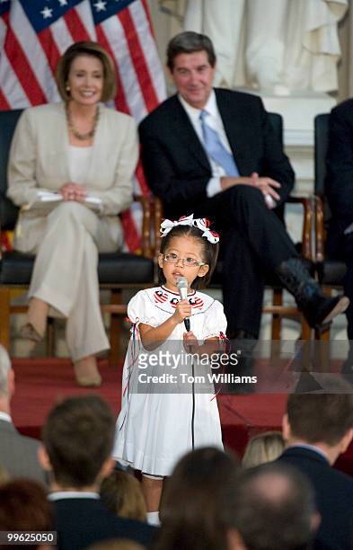 Malia Thibado from the Alabama School for the Blind, sings "God Bless America" as Speaker Nancy Pelosi, D-Calif., and Gov. Bob Riley, R-Ala., during...
