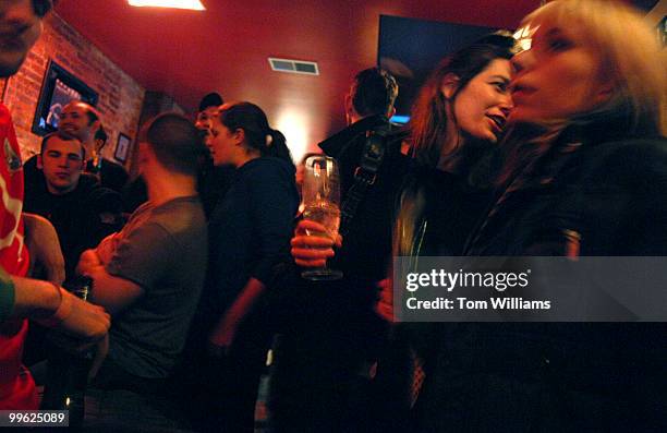 Patrons attend the opening night of the Pug on H street, NE.