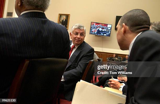 Commissioner of the National Basketball Association, David Stern, talks with this attorneys before a hearing of the House Energy and Commerce...