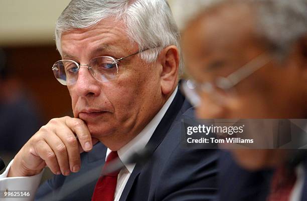 Commissioner of the National Basketball Association, David Stern, left, listens to testimony of NBA, Exec. Dir., William Hunter, during a hearing of...