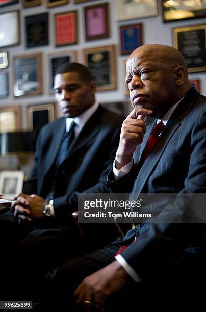 Herschel Walker, Heisman Trophy winner, meets with Rep. John Lewis, D-Ga., to talk about the importance of physical fitness and education programs in...