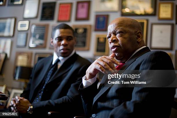 Herschel Walker, Heisman Trophy winner, meets with Rep. John Lewis, D-Ga., to talk about the importance of physical fitness and education programs in...