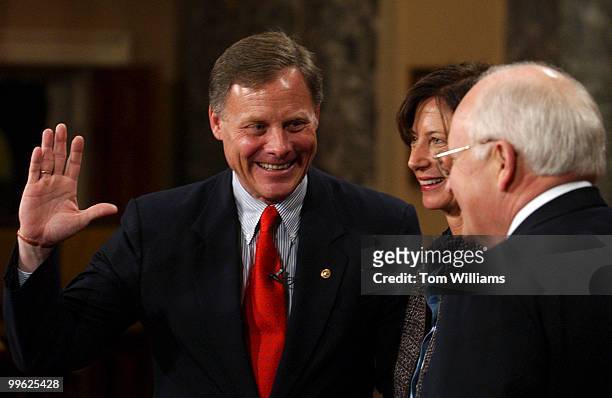Sen. Richard Burr, R-S.C., alongside his wife Brooke, is sworn into the 109th Congress by Vice President Dick Cheney.