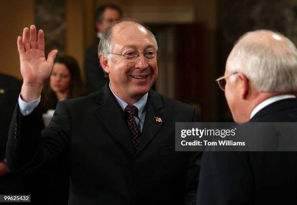 Sen. Ken Salazar, D-Colo., is sworn into the 109th Congress by Vice President Dick Cheney.