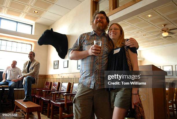 Storm and Christine Shirley listen to Senate candidate Jon Tester speak at a fundraiser at the Mint Bar and Cafe in Belgrade, Montana.