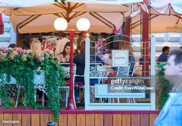 Cityview on Red Square with restaurants at GUM Shopping Mall, Kremlin, Saint Basil's Cathedral and State Historical Museum on July 8, 2018 in Moscow,...