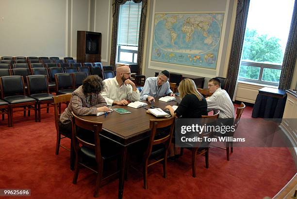 From left, Sharon Beth Kristal, Tom Jones, Bill Dauster, Charlotte Ivancic, and Adam Samuel Roth conduct a Torah study group in Rayburn.