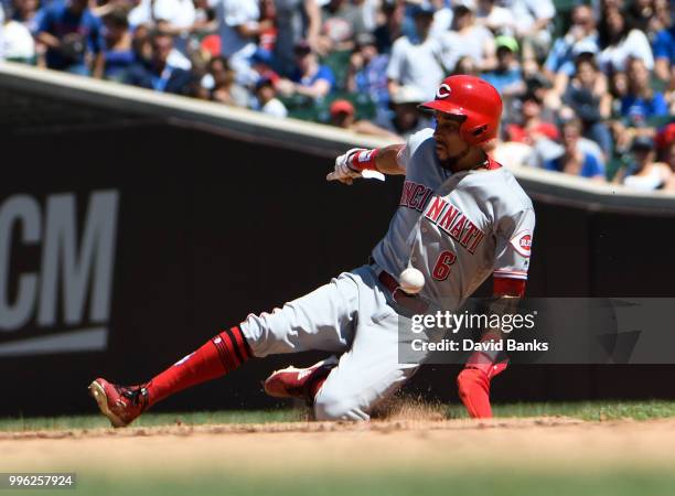 Billy Hamilton of the Cincinnati Reds steals second base against the Chicago Cubs on July 8, 2018 at Wrigley Field in Chicago, Illinois. The Cubs won...