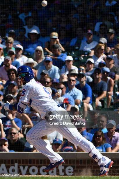 Javier Baez of the Chicago Cubs bats against the Cincinnati Reds on July 8, 2018 at Wrigley Field in Chicago, Illinois. The Cubs won 6-5 in ten...