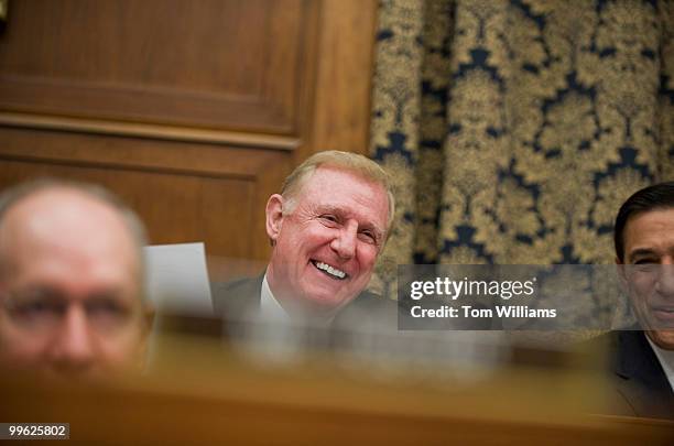 Rep. Dan Burton, R-Ind., shares a light moment wile questioning Ray LaHood, Secretary of Transportation, during a House Oversight and Government...