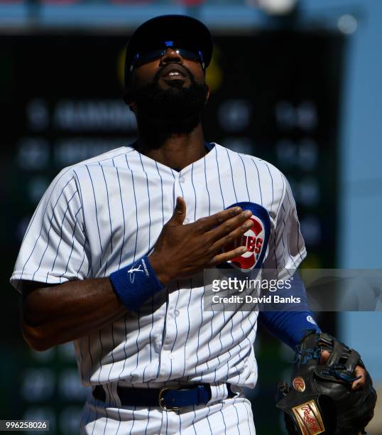Jason Heyward of the Chicago Cubs reacts after making a catch on Scooter Gennett of the Cincinnati Reds during the eighth inning on July 8, 2018 at...