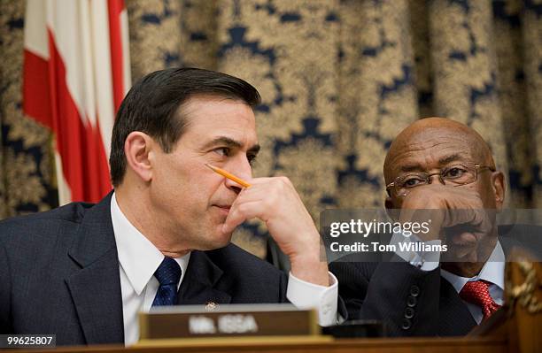 Chairman Edolphus Towns, D-N.Y., right, and ranking member Darrell Issa, confer during a House Oversight and Government Reform Committee hearing on...