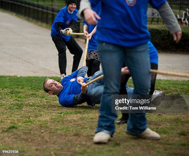 Democratic staffers including Roger Thoman, office of Sen. Jeanne Shaheen, D-N.H., battle republican staffers with during a tug of war hosted by...