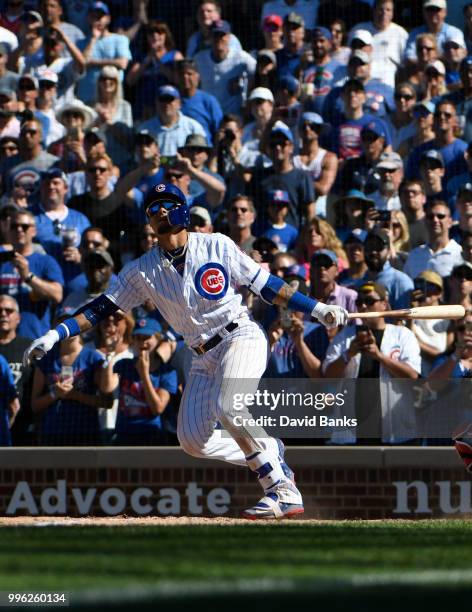 Javier Baez of the Chicago Cubs bats against the Cincinnati Reds on July 8, 2018 at Wrigley Field in Chicago, Illinois. The Cubs won 6-5 in ten...