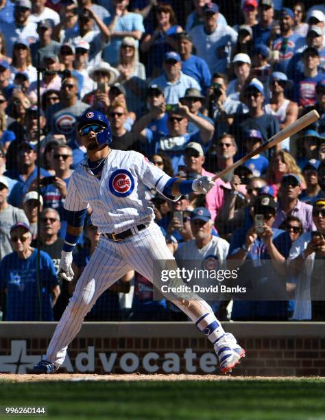 Javier Baez of the Chicago Cubs bats against the Cincinnati Reds on July 8, 2018 at Wrigley Field in Chicago, Illinois. The Cubs won 6-5 in ten...