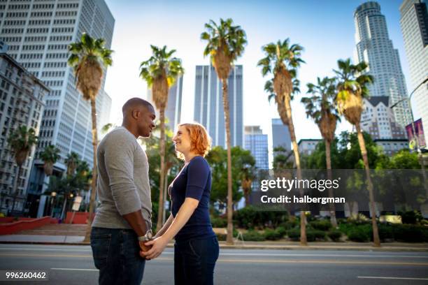 romantic la couple near pershing square - pershing square stock pictures, royalty-free photos & images