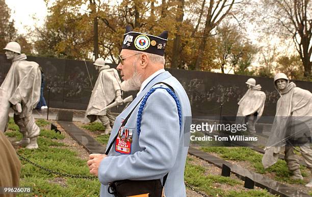 Korean War Veteran, Gary Rudinger of Minn., walks through the Korean War Memorial on Veteran's Day.